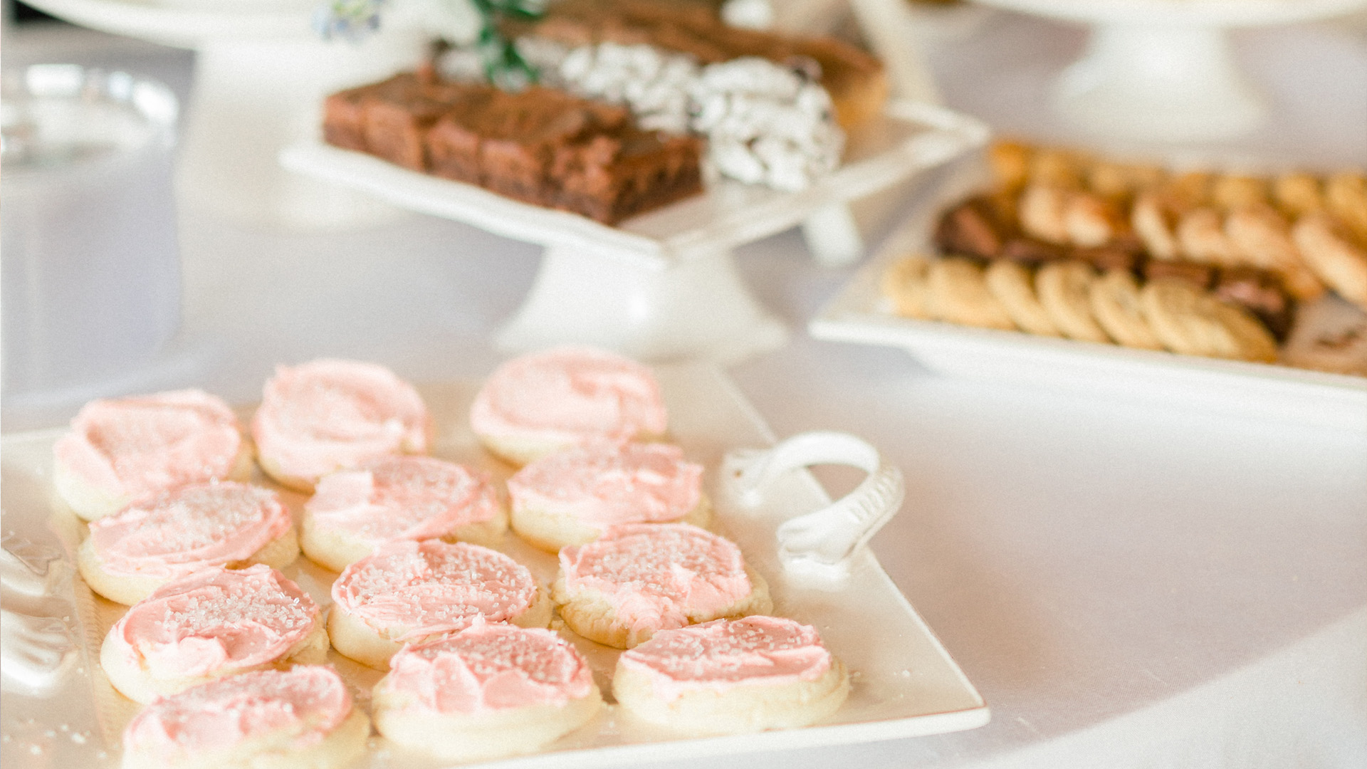 Pink frosted cookies display